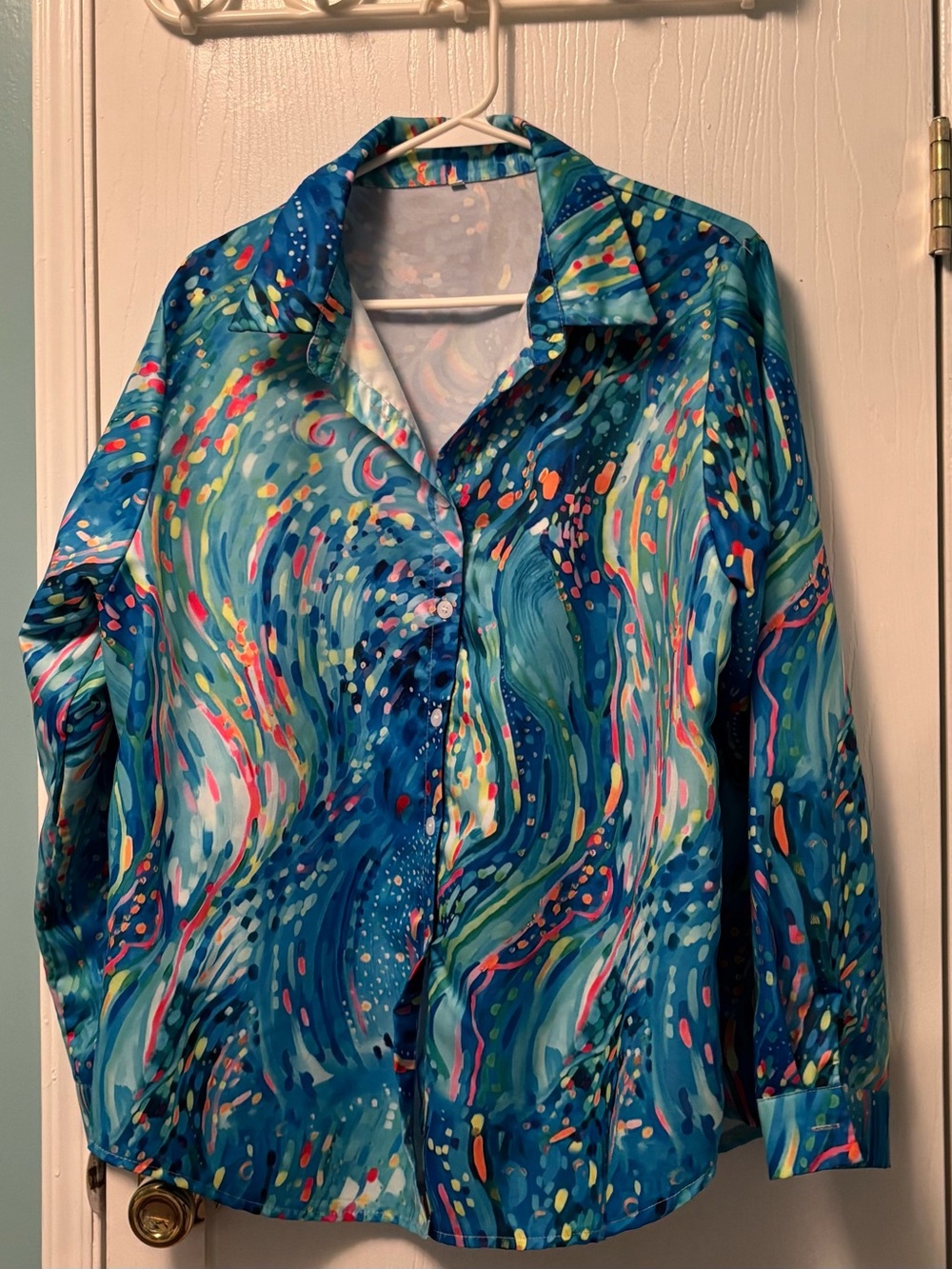 Beautiful colored pattern blouse.